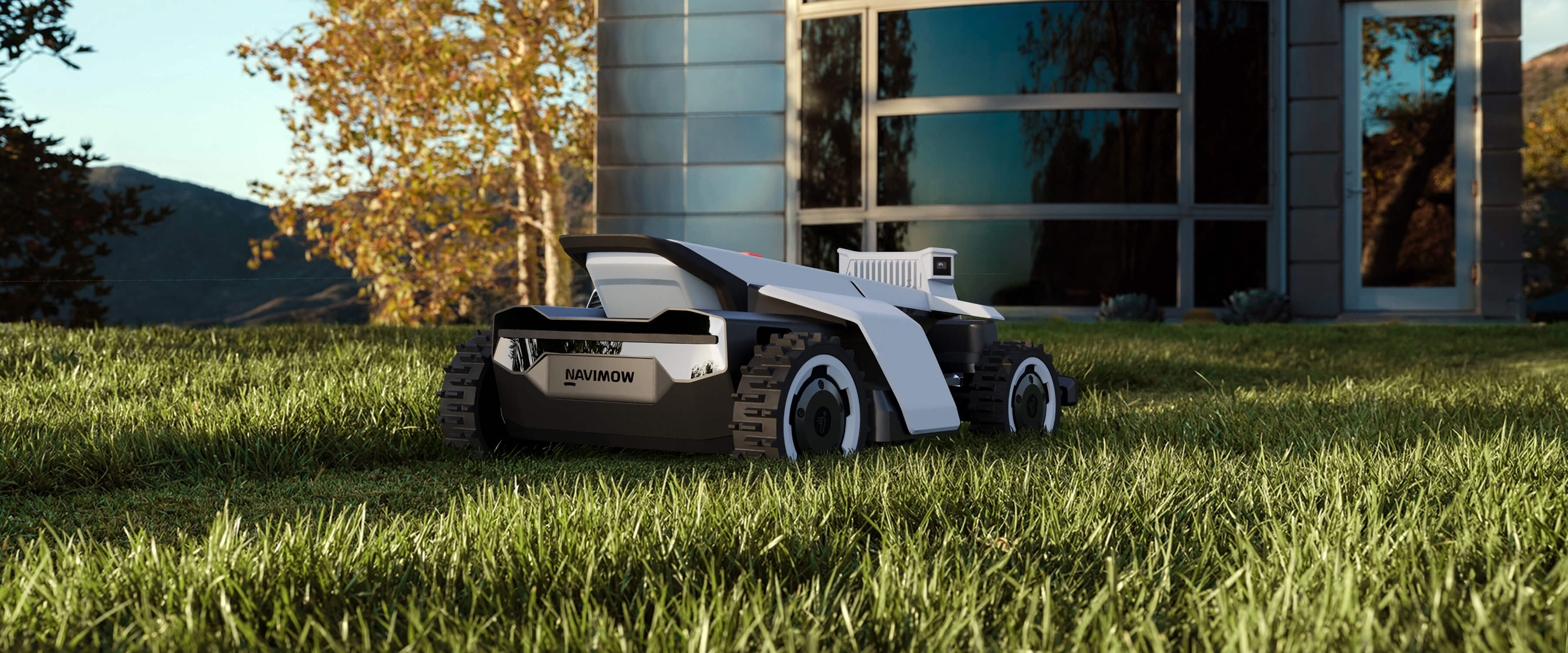 Navimow i110E robotmaaier op het gazon bij een modern huis.